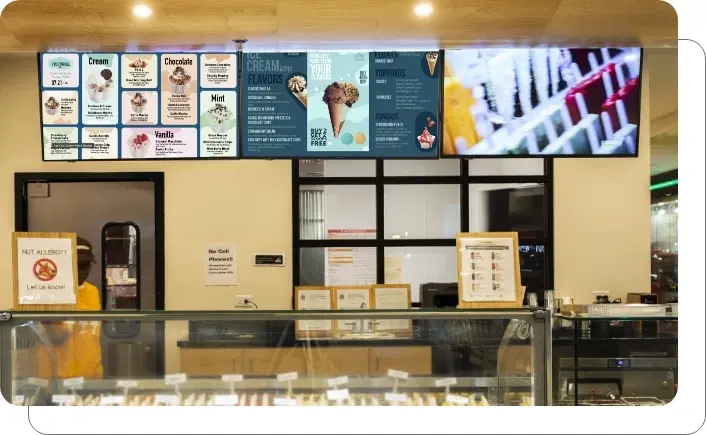 Ice cream parlor digital menu board showing mix-and-match toppings