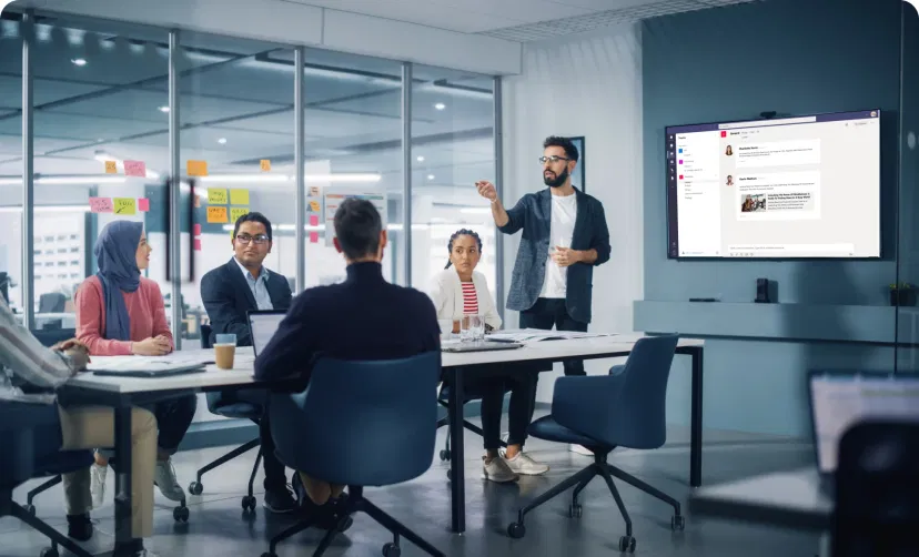 Digital signage displaying Microsoft Teams messages for team appreciation and recognition