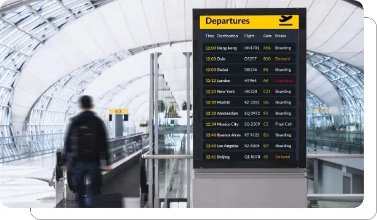 Airport digital signage showing flight information