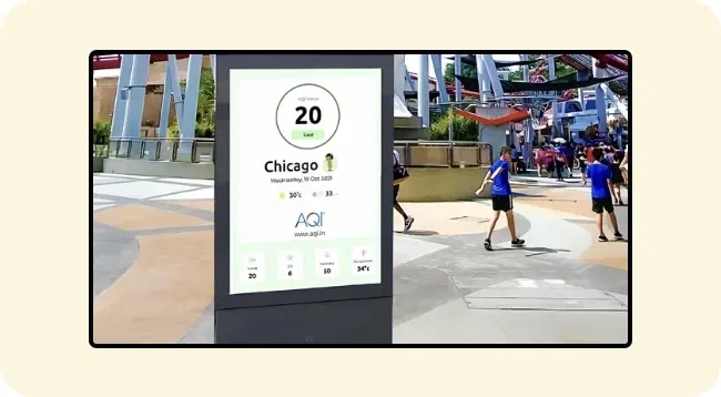 Digital signage screen showing real-time weather and air quality updates Digital signage screen showing real-time weather and air quality updates