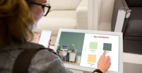 Interactive kiosk displays in asian paint store used for visitors to interact with get price and color selection information Interactive kiosk displays in asian paint store used for visitors to interact with get price and color selection information